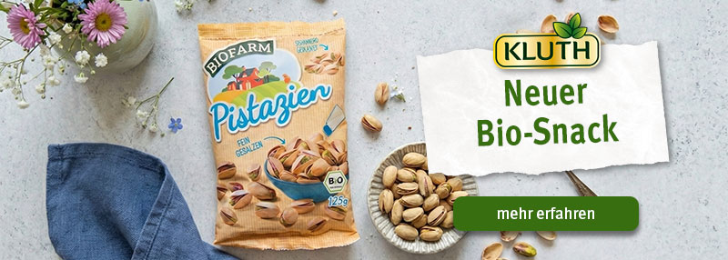 Tüte Bio Pistazien von KLUTH und ein Schälchen mit Pistazien