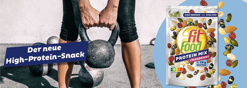 Bild - Der neue Protein Snack Fit Food Protein Mix Cranberry und Frau mit Hantel